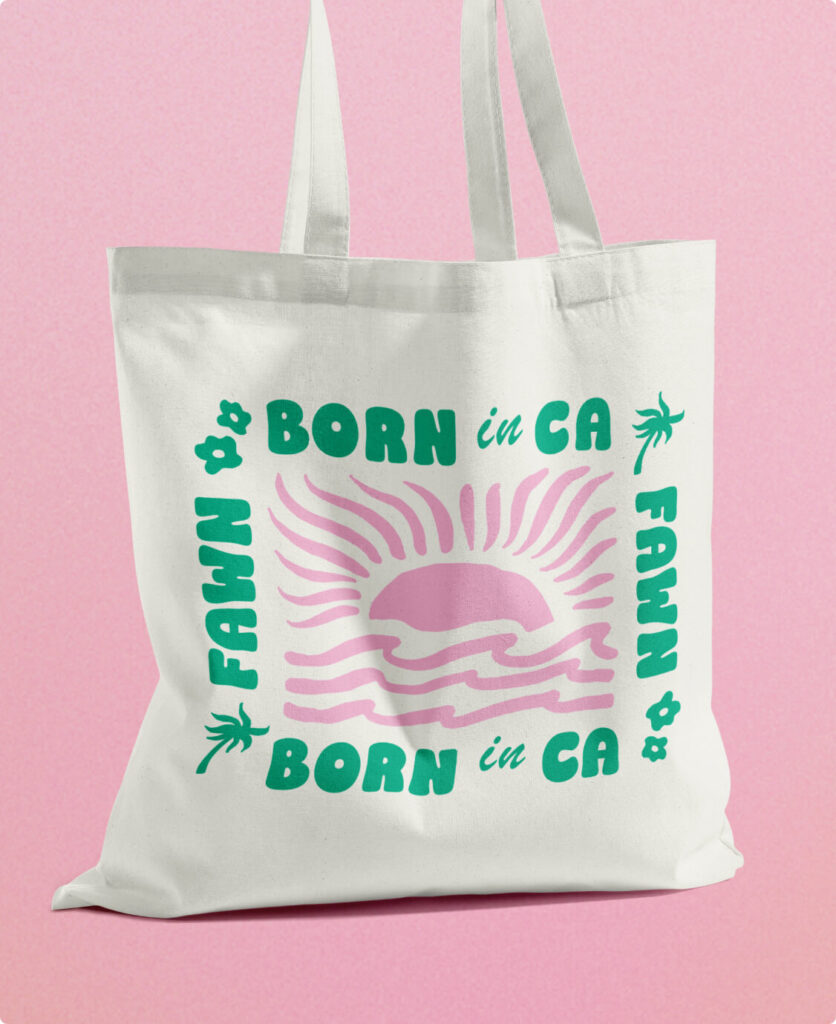 A Fawn tote bag with a sun and waves graphic that reads "Born in California."